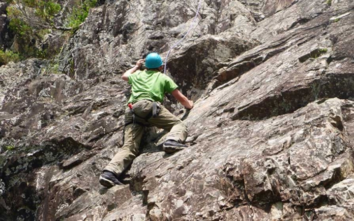 teens learn rock climbing skills on outdoor leadership course